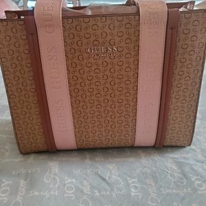 Guess Pocketbook with Pink Straps Measurment 13"×10.5×4.5